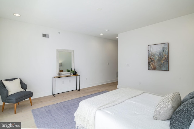 bedroom with light wood-type flooring