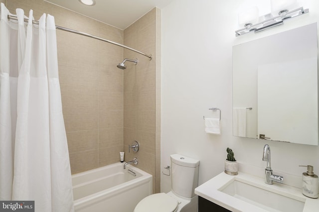 full bathroom with shower / bath combo, vanity, and toilet