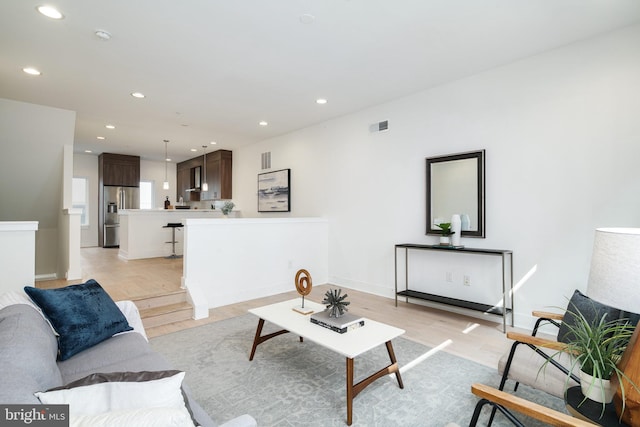 living room featuring light hardwood / wood-style floors