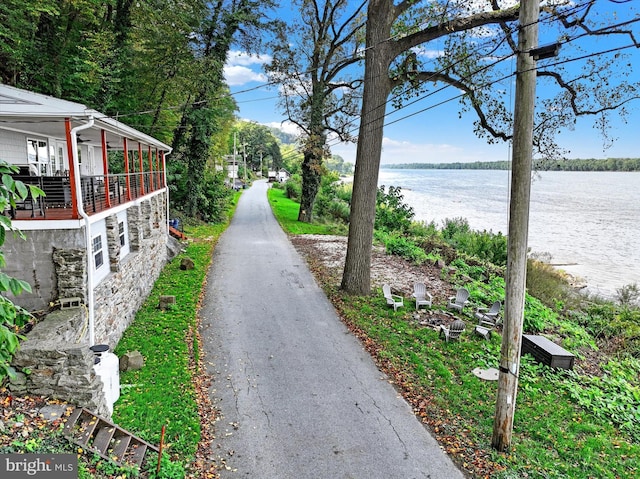 view of road featuring a water view