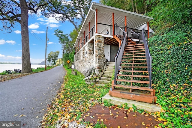 view of home's exterior featuring a water view