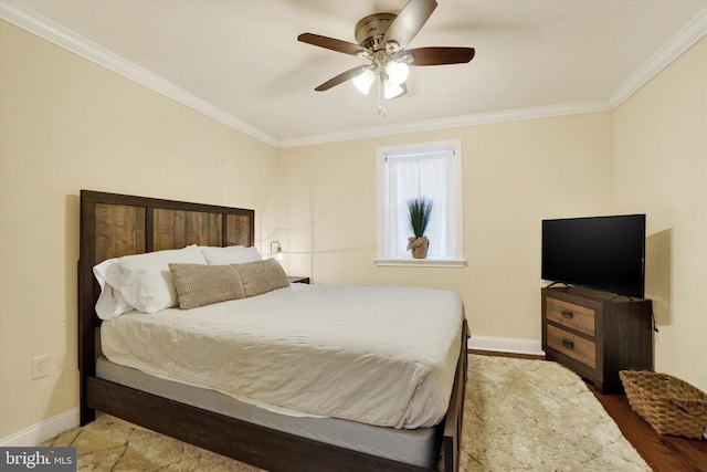 bedroom with wood-type flooring, ceiling fan, and ornamental molding