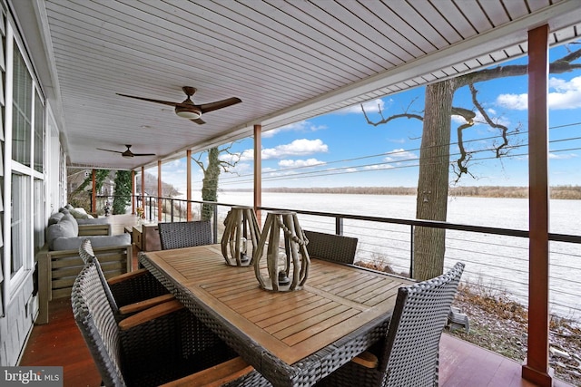 exterior space featuring ceiling fan