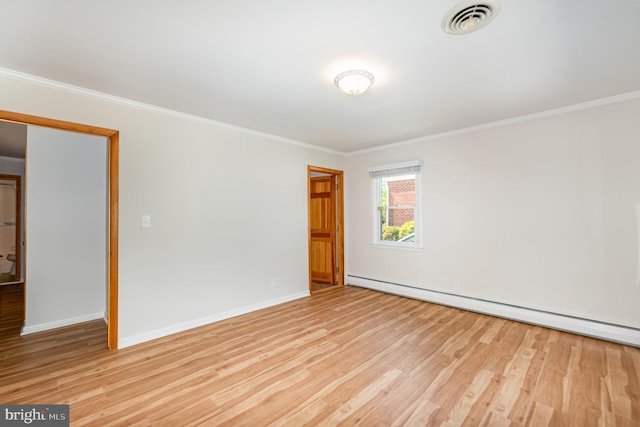 939 Starbit Rd, Towson, MD 21286 - spare room with visible vents, ornamental molding, wood finished floors, and a baseboard radiator