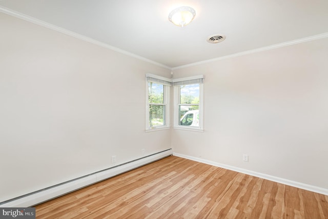 939 Starbit Rd, Towson, MD 21286 - empty room featuring crown molding, light wood finished floors, baseboards, a baseboard radiator, and visible vents
