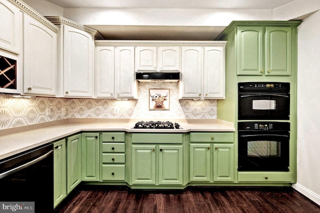 kitchen with tasteful backsplash, white cabinetry, dark wood-type flooring, and black appliances