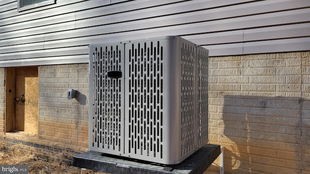 exterior details featuring central AC