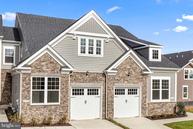 craftsman inspired home featuring a garage