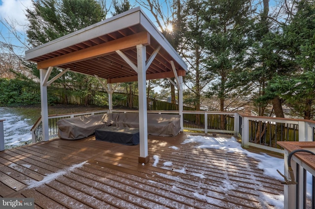 view of snow covered deck