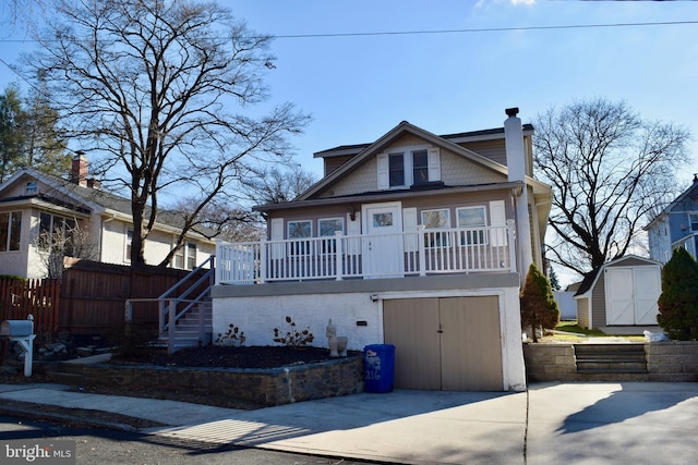 view of front facade with a shed