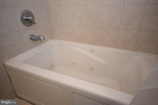 bathroom with a bathing tub