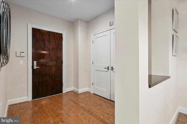 entryway with light hardwood / wood-style floors