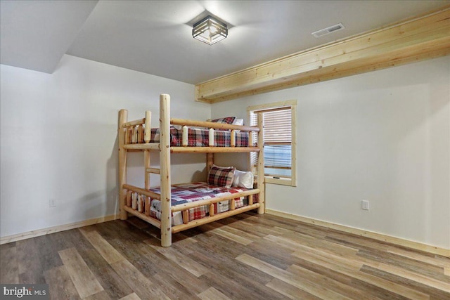 bedroom featuring hardwood / wood-style flooring