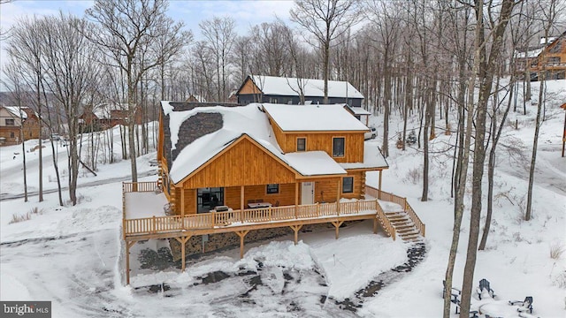 view of snow covered property