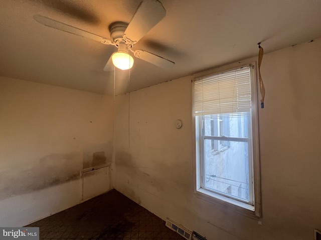 spare room featuring ceiling fan