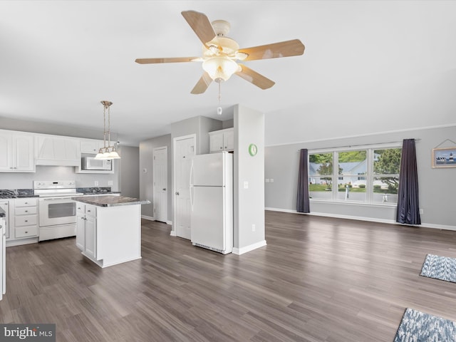 kitchen with white appliances, ceiling fan, white cabinets, a kitchen island, and hanging light fixtures