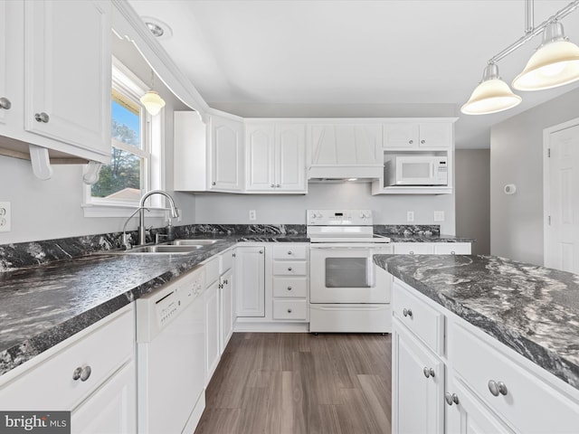 kitchen with white cabinetry, sink, dark wood-type flooring, pendant lighting, and white appliances