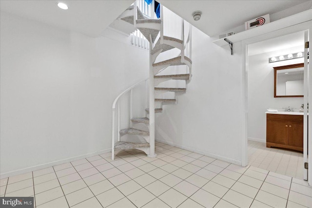 staircase with tile patterned flooring