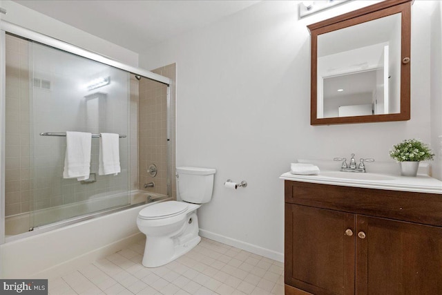 full bathroom featuring tile patterned flooring, bath / shower combo with glass door, vanity, and toilet