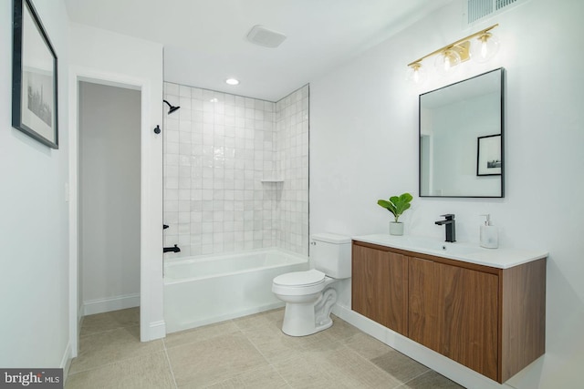 full bathroom featuring tile patterned flooring, toilet, vanity, baseboards, and washtub / shower combination