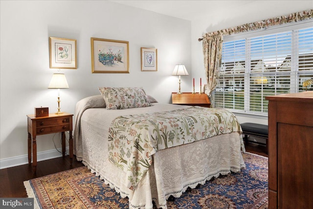 bedroom featuring dark hardwood / wood-style floors