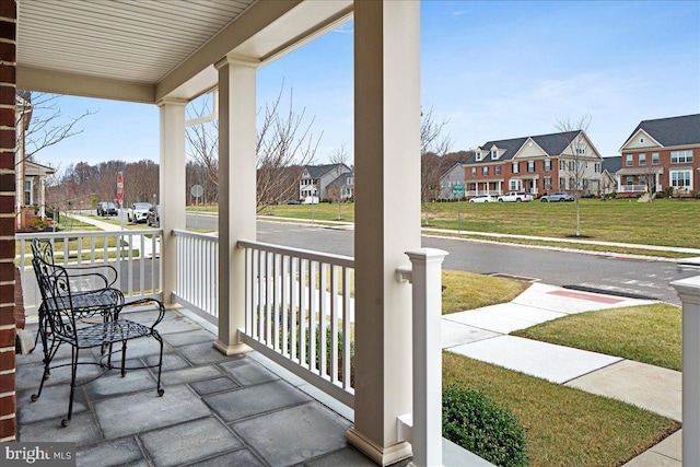 balcony featuring covered porch