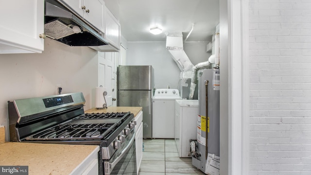 kitchen with light tile patterned floors, gas water heater, washer / dryer, white cabinets, and appliances with stainless steel finishes