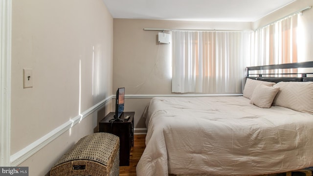 bedroom featuring hardwood / wood-style flooring