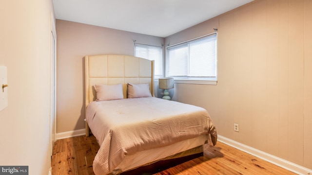 bedroom featuring hardwood / wood-style flooring