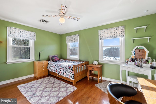 bedroom featuring ceiling fan and wood-type flooring