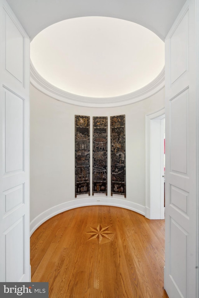 spare room featuring hardwood / wood-style flooring