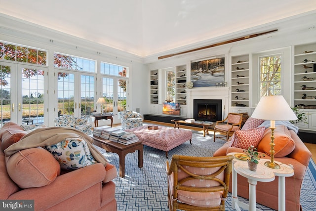 sunroom / solarium featuring plenty of natural light and french doors