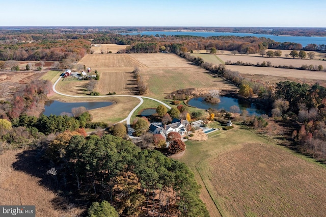 aerial view with a water view and a rural view