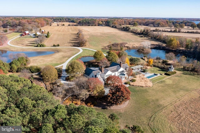 drone / aerial view with a water view and a rural view