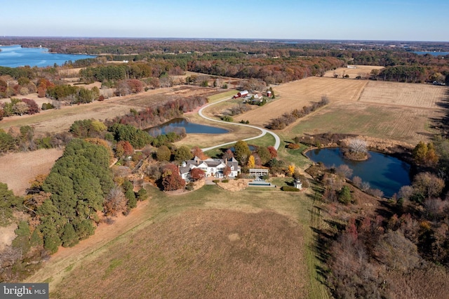 aerial view with a water view and a rural view