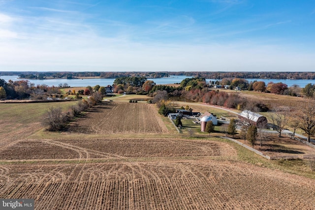 aerial view with a water view and a rural view