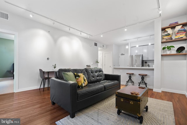 living room featuring hardwood / wood-style flooring