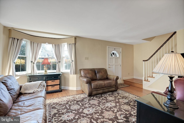 living room with light hardwood / wood-style flooring