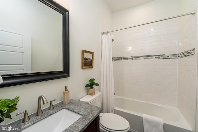 full bath with shower / bath combo, vanity, and toilet