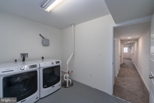 laundry room featuring laundry area and washing machine and clothes dryer