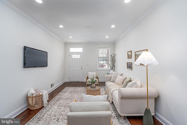 living area with dark wood-style floors, crown molding, recessed lighting, and baseboards