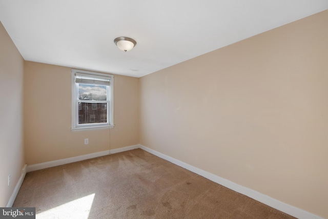 empty room with carpet floors