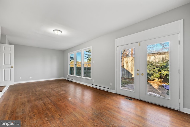 interior space with a baseboard radiator, visible vents, a wealth of natural light, and french doors