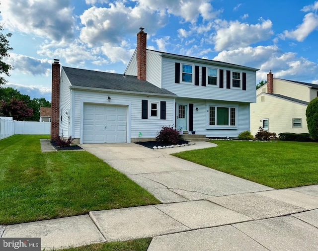 view of front facade featuring a garage and a front yard