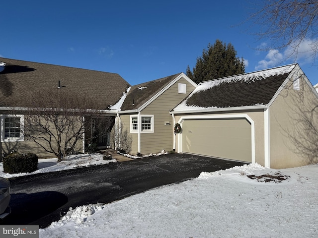 exterior space with a garage