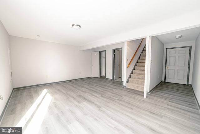 unfurnished room featuring light wood-type flooring