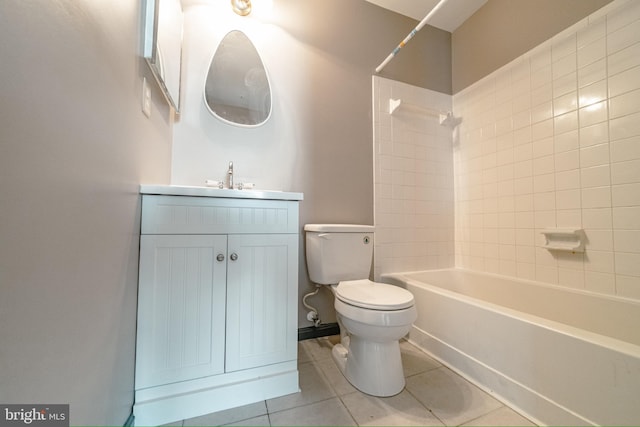 full bathroom with tile patterned floors, vanity, toilet, and tiled shower / bath