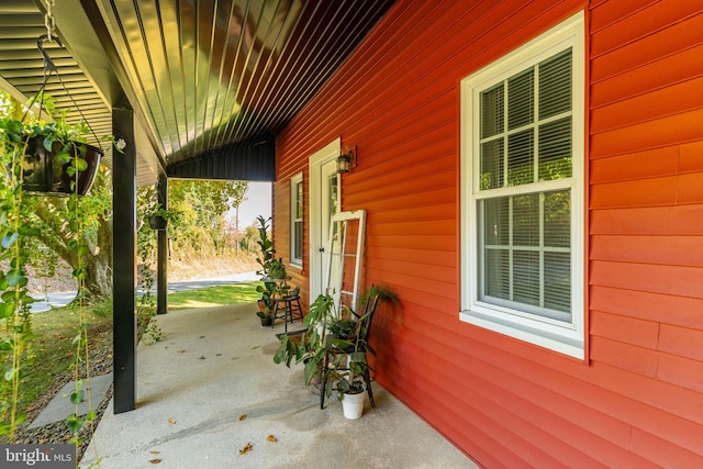 view of patio featuring a porch