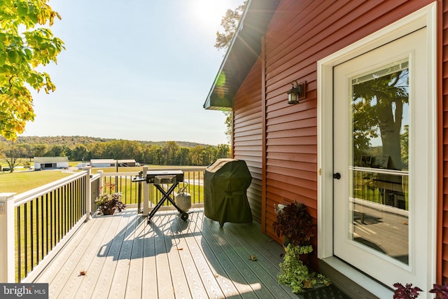 wooden deck with area for grilling