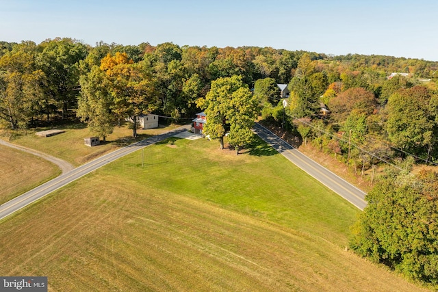 birds eye view of property featuring a rural view